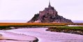 Le Mont-Saint-Michel. Il y a 7.500 ans lors de la fin de la dernière glaciation, la mer a envahi cet espace. Le Couesnon Damon a été construit pour que le Mont-Saint- Michel devienne de nouveau une île.（攝影: MYCHELE DANIAU / AFP ImageForum）  