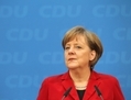 LégendetLe 28 mars 2011 à Berlin, la chancelière allemande et leader du Parti CDU Angela Markel s’adresse aux médias le lendemain des élections dans le Bade-Wurtemberg et dans la Rhénanie-Palatinat. (Sean Gallup/Getty Images)