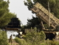 Soldats circulant à proximité d’une batterie de missiles Patriot au Mont Carmel, en Israël, le 9 octobre 2012. (Jack Guez/AFP/GettyImages)