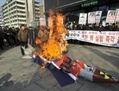 Des militants conservateurs participent à une manifestation le 13 février 2013 à Séoul pour dénoncer l'essai nucléaire nord-coréen. (Jung Yeon-Je/AFP/Getty Images)