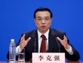 Le 17 mars, Li Keqiang, le Premier ministre de la République populaire de Chine, donne sa première conférence de presse au Grand palais du peuple à Pékin. Li a fait mention de l’importance de la constitution en soutenant la nouvelle ligne politique du Parti de Xi Jinping. (Lintao Zhang/Getty Images)

