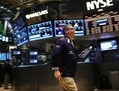 L’indice des actions S&P 500 a fini la séance du 28 mars 2013 au plus à 1569,19 à la bourse New York Stock Exchange. (Spencer Platt/Getty Images)
