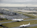 La cessation d'actions de l'État dans les aéroports français, comme ici à Roissy, s'inscrit dans un plan de relance économique (PIERRE VERDY / AFP)  