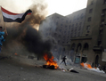 Des partisans de l'ex-président égyptien, Mohamed Morsi, affrontent les forces de l'ordre dans les rues du Caire le 6 octobre 2013. (Mohammed Abdel Moneim/AFP/Getty Images)