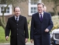 Le Premier ministre britannique David Cameron et le président français François Hollande arrivent au sommet bilatéral à Brize Norton près d’Oxford le 31 janvier 2014.  (Etienne Laurent/AFP/Getty Images)