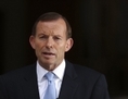 Le Premier ministre australien Tony Abbott s’exprime lors d’une conférence de presse à Canberra en Australie le 12 novembre 2013. Les militants pensent que l’Australie exerce trop peu de pression sur la Chine au sujet des violations des droits de l’homme. (Stefan Postles/Getty Images)