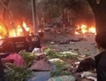 22 mai 2014: Une scène de chaos dans un marché en plein air d’Urumqi dans le Xinjiang après une attaque à l’explosif. (Weibo.com)