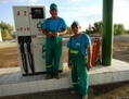 Employés d’une station-service au Turkménistan. (RFE/RL)