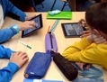 Des élèves de l’école primaire apprennent à utiliser des tablettes numériques, le 12 septembre 2013 à Saint Brieuc. (Damien Meyer/AFP/Getty Images)
