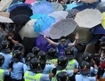 Hong Kong le 28 septembre 2014 - Un p’tit coin d’parapluie, contre un coin d’paradis… (Aaron Tam/AFP/Getty Images)
