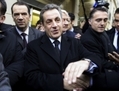 Nicolas Sarkozy arrivant au bureau de vote de l’UMP dans le XVIe arrondissement, le 29 novembre 2014. (Kenzo Tribouillard/AFP/Getty Images)

