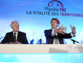  En juin 2014, l’ancien ministre de l’Économie Arnaud Montebourg et le président de la CGPME lors de la 12e édition de «Planète PME».  (Eric Piermont/AFP/Getty Images) 

