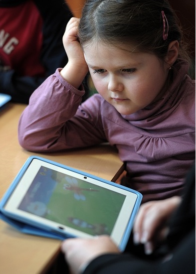 Découverte de la tablette tactile dans une école maternelle à Haguenau en Alsace, en 2013.  (Frédérik Florin/AFF/Getty Images)