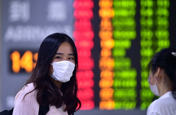 L'épidémie semble contenue en Corée du Sud mais l'OMS exige la plus grande vigilance de la part de tous les pays (JUNG YEON-JE/AFP/Getty Images)