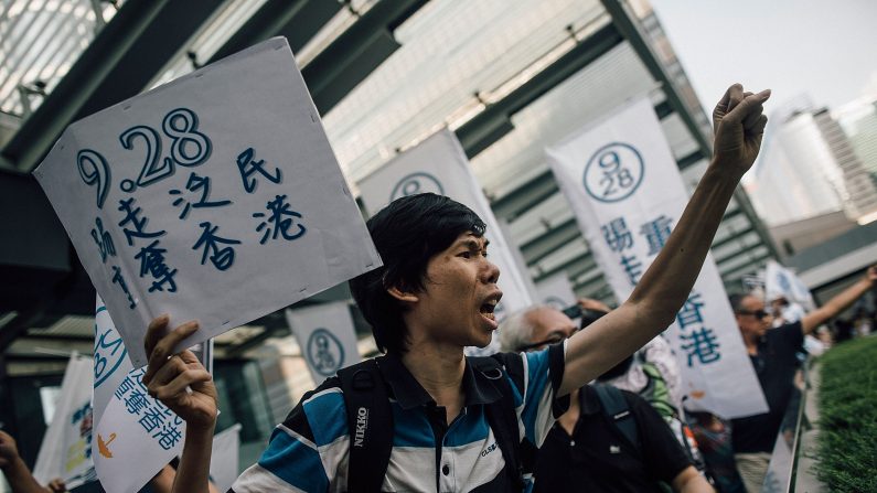 Le 28 Septembre 2014, un manifestant hong kongais proteste contre le régime chinois.  (Anthony Kwan/Getty Images)