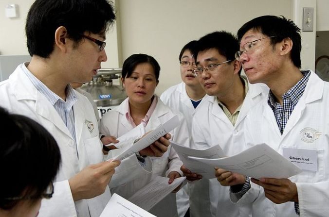Les scientifiques chinois. Photo SAUL LOEB / AFP / Getty Images