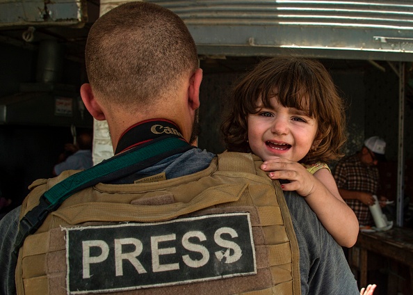 Un (vrai) photographe reporter de guerre anonyme, contrairement à celui nommé dans l'article. ( FADEL SENNA/AFP/Getty Images)