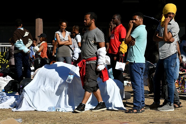 Un groupe de réfugiés demandeur d'asile dans les rue de Rome en Italie. (ALBERTO PIZZOLI/AFP/Getty Images)