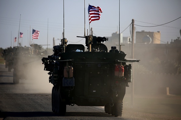 "Les troupes de la 3e brigade blindée (américaine) devaient remplacer les soldats de la 2e brigade blindée des forces américaines."
(DELIL SOULEIMAN/AFP/Getty Images)