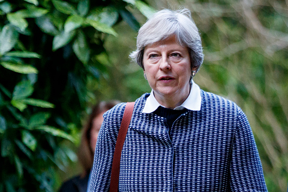 Les déboires de Theresa May ne sont pas sans rappeler les derniers jours de Margaret Thatcher, poussée dehors en 1990 par ses propres troupes.
(TOLGA AKMEN/AFP/Getty Images)