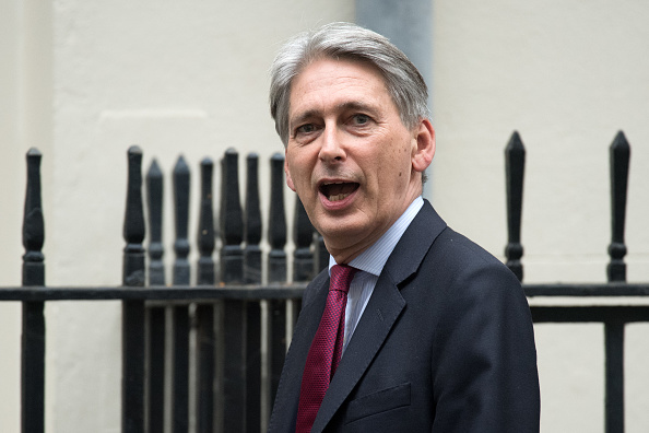 Le 9 octobre à Londres, le ministre de l'Économie Philip Hammond, a particpé à un meeting organisé par Theresa May. 
(Carl Court/Getty Images)