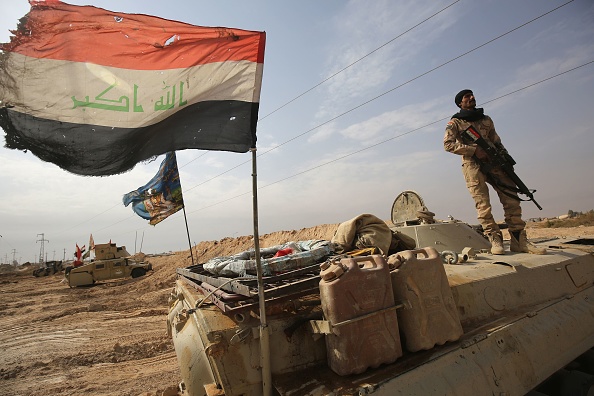 Les forces irakiennes près de la frontière syrienne, le 4 novembre 2017, après avoir repris la veille à l’EI la ville frontalière de Qaim, à l’ouest d’Anbar. (AHMAD AL-RUBAYE/AFP/Getty Images)