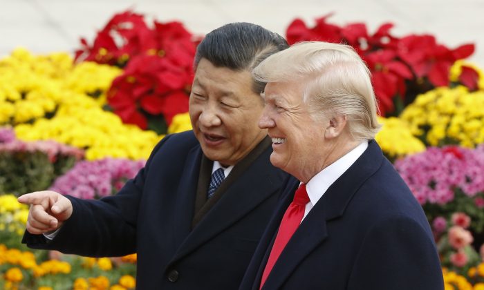 Donald Trump et le dirigeant chinois Xi Jinping lors de la cérémonie d’accueil à Pékin, le 9 novembre 2017. (Thomas Peter-Pool / Getty Images)