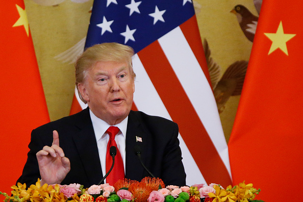 Le président américain Donald Trump et le président chinois Xi Jinping (non représenté) font une déclaration conjointe au Grand Palais du Peuple le 9 novembre 2017 à Beijing, en Chine. Trump est sur un voyage de 10 jours en Asie. 
(Thomas Peter-Pool / Getty Images)