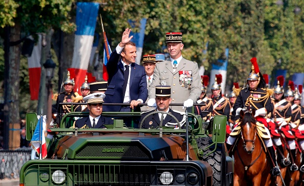    Le président Emmanuel Macron a ouvert samedi les festivités du 14 juillet  (Photo : PHILIPPE WOJAZER/AFP/Getty Images)