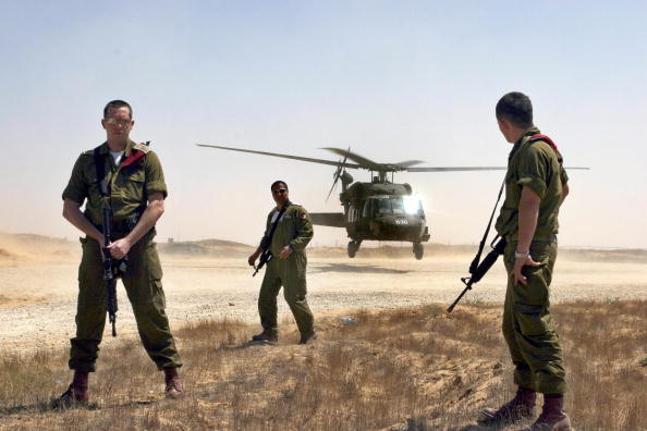 Ces hommes armés venaient de la partie du Golan restée sous le contrôle de la Syrie. Photo LIMOR EDREY / AFP / Getty Images.