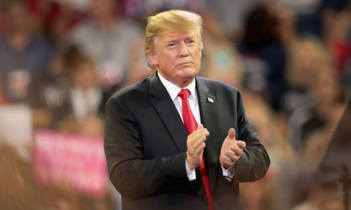 Le président Donald Trump s'adresse aux partisans lors d'un rassemblement électoral à l'Amsoil Arena de Duluth, au Minnesota, le 20 juin 2018. (Scott Olson/Getty Images)