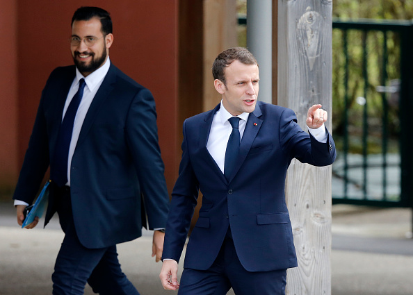 Le président Emmanuel Macron et Alexandre Benalla, avril 2018.      (Photo : CHARLY TRIBALLEAU/AFP/Getty Images)