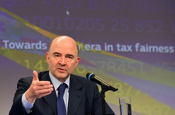 -Pierre Moscovici, commissaire européen chargé des affaires économiques et financières, de la fiscalité et des douanes, tient une conférence de presse à Bruxelles. Photo EMMANUEL DUNAND / AFP / Getty Images.