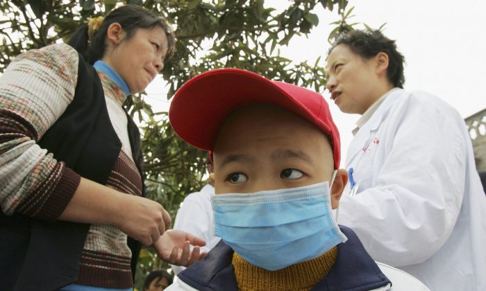 Un garçon chinois atteint de leucémie. (Chine Photos/Getty Images)