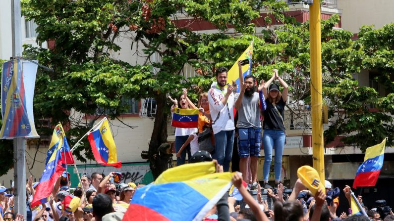 Des Vénézuéliens manifestent contre le régime de Maduro à Caracas, Venezuela, le 9 mars 2019. (Edilzon Gamez/Getty Images)