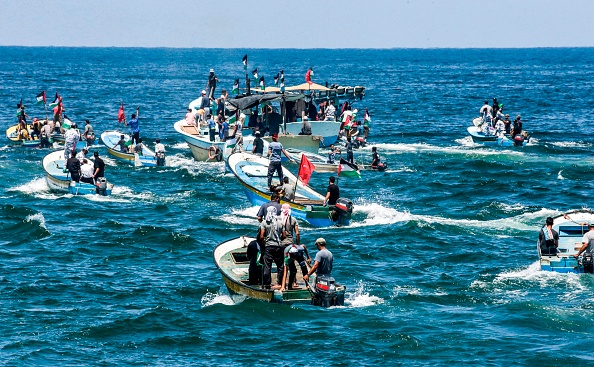 -La distance de 15 milles nautiques est la plus grande autorisée depuis des années par Israël, Photo de MAHMUD HAMS / AFP / Getty Images.