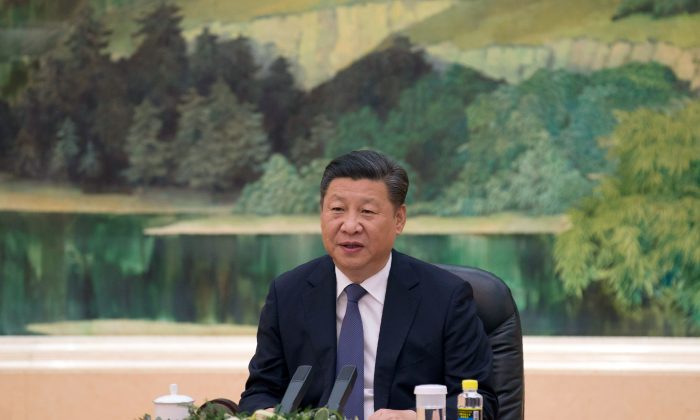 Le dirigeant chinois Xi Jinping dans le Grand palais du Peuple à Pékin, le 28 juillet. (Andy Wong/AFP/GETTY IMAGES)