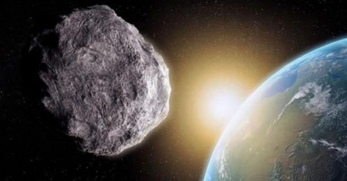 Le travail d'un artiste montre un astéroïde près de la Terre. (NASA)