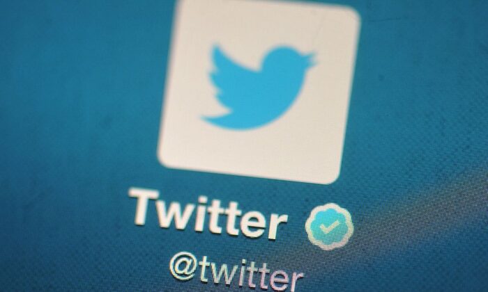 Dans cette illustration, le logo Twitter est affiché sur un appareil mobile à Londres, en Angleterre, le 7 novembre 2013. (Photo de Bethany Clarke / Getty Images)
