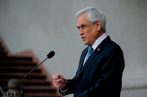 Le président chilien Sebastian Piñera a reconnu n'avoir pas anticipé la crise et demandé "pardon" à ses compatriotes. (Photo : JAVIER TORRES/AFP/Getty Images)