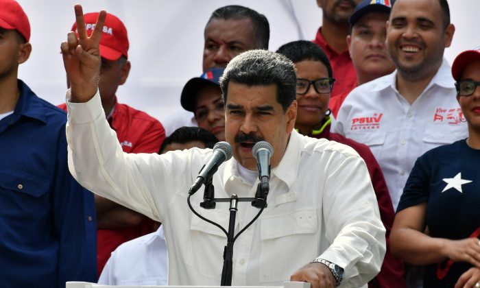 Le chef du régime vénézuélien Nicolas Maduro prend la parole lors d'un rassemblement au Palais présidentiel de Miraflores à Caracas, Venezuela, le 9 mars 2019. (Yuri CortezY/AFP/Getty Images)
