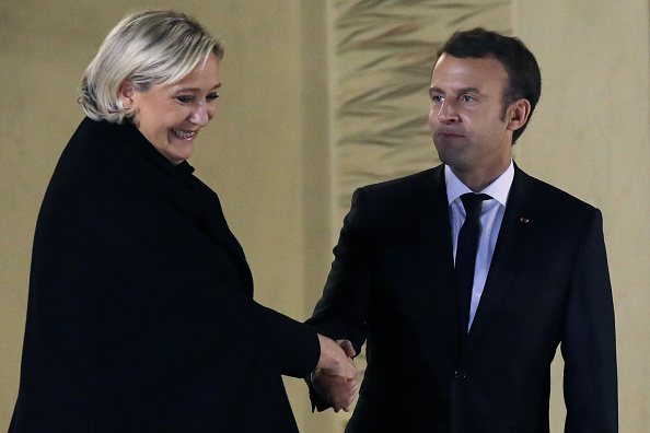Marine Le Pen et le Président Emmanuel Macron. (Photo : LUDOVIC MARIN/AFP via Getty Images)