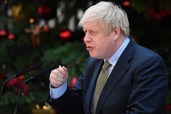 -Le Premier ministre britannique Boris Johnson, appelle le pays à réfléchir sur l'année qui s'est écoulée, et célébrer "les bonnes choses qui arrivent". Photo de DANIEL LEAL-OLIVAS / AFP via Getty Images.