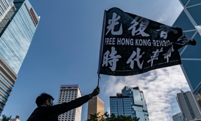 Des professionnels du secteur de la publicité participent à un rassemblement pour entamer une grève de cinq jours à Hong Kong le 2 décembre 2019. (Anthony Kwan/Getty Images)