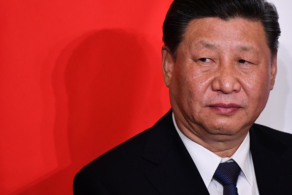 -Le président chinois Xi Jinping fait une annonce à la télévision chinoise sur le coronavirus. Photo d'Alberto PIZZOLI / AFP via Getty Images.