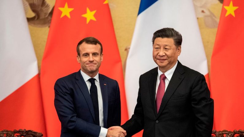 Le président français Emmanuel Macron et son homologue chinois Xi Jinping. (NICOLAS ASFOURI / POOL / AFP)