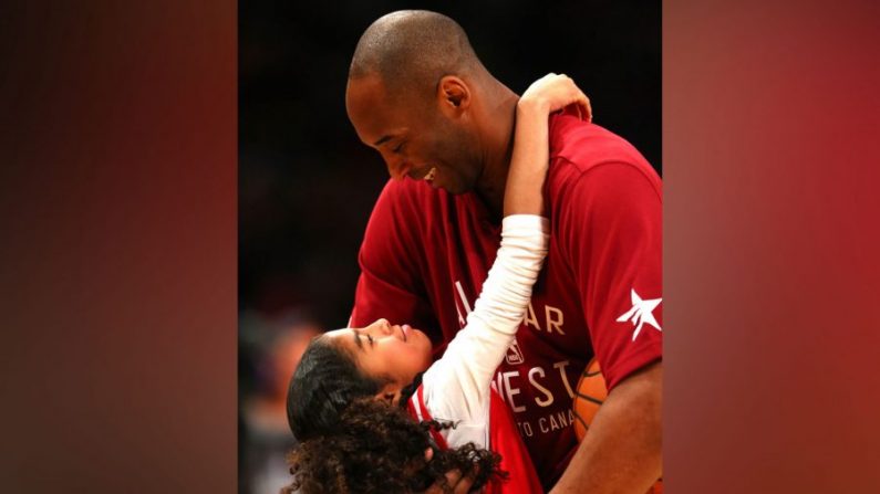 Kobe Bryant #24 of the Los Angeles Lakers and the Western Conference warms up with daughter Gianna Bryant during the NBA All-Star Game 2016 at the Air Canada Centre in Toronto, Canada, on Feb. 14, 2016. (Elsa/Getty Images)