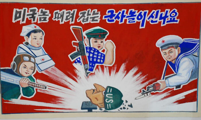 Affiche de propagande dans une école primaire à la ferme de Chongsan-ri en Corée du Nord. (Flickr | stephan)