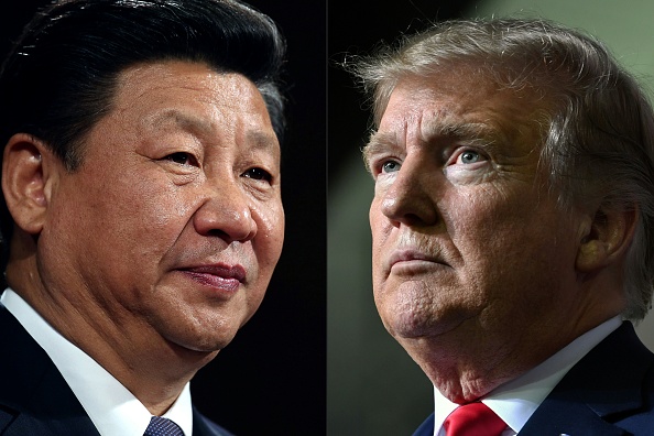 Le dirigeant chinois Xi Jinping et le président américain Donald Trump (Photo de DAN KITWOOD, NICHOLAS KAMM/AFP via Getty Images)