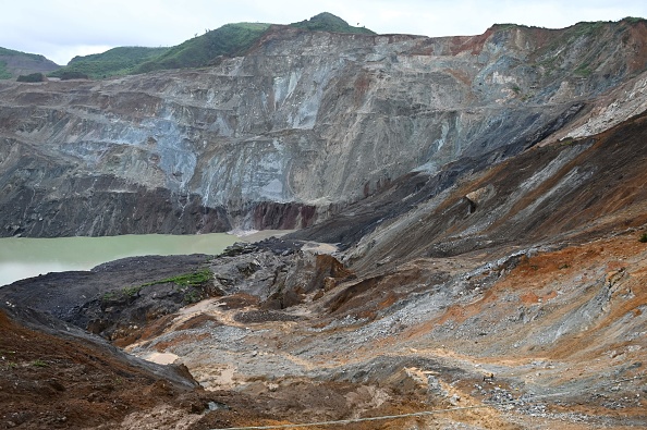 -Une vue du site d'un glissement de terrain mortel dans une zone où des mineurs travaillent dans des mines de jade à ciel ouvert près de Hpakant dans l'État de Kachin le 4 juillet 2020. - Photo de Ye Aung THU / AFP via Getty Images.